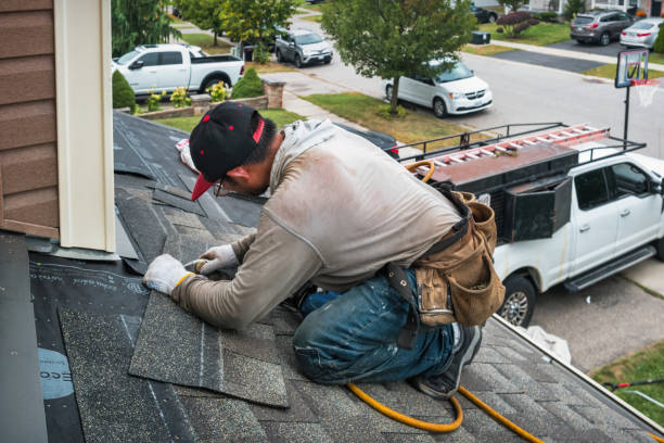 Professional Roofing technician working in Longbranch, WA